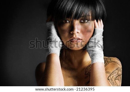 stock photo Cute Asian girl covered in dirt and grease