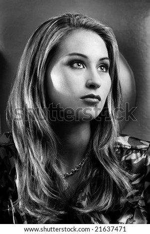 Black and white portrait of beautiful woman with flowing hair