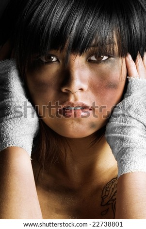 stock photo Cute Asian girl covered in dirt and grease