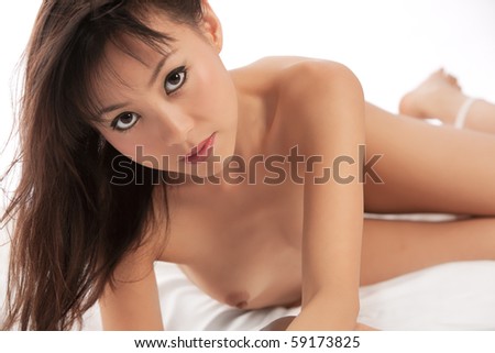 stock photo Asian woman naked on white bed and background