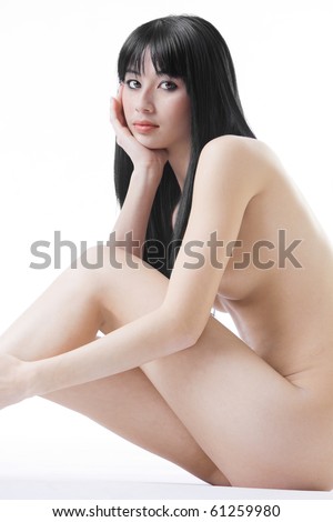 stock photo Beautiful Eurasian woman naked on white studio background