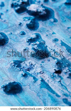 Blue nail polish texture with crushed eye shadow