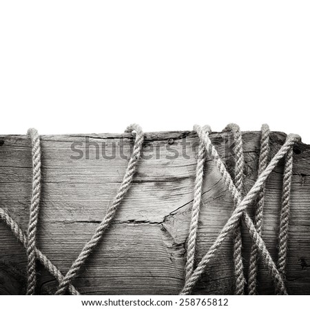 Wooden board with rope isolated on white background