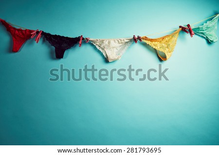 Female panties hanging on rope