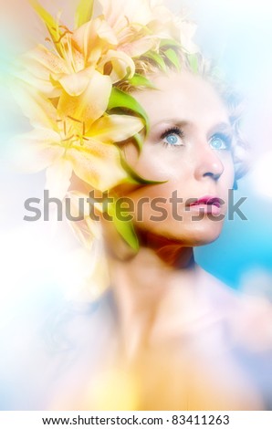 Fantasy portrait of young lady with lily flowers