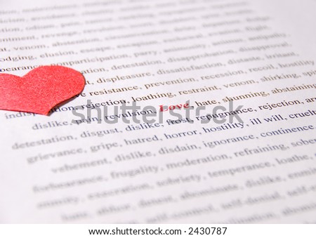 The word Love in red with paper heart against Antonyms (opposite words)