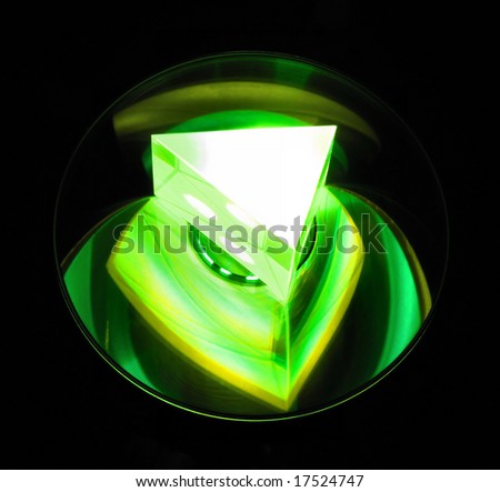 reflection of a glass prism lit up by a laser beam