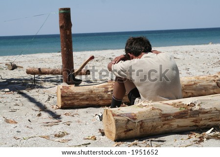 A young men resting from manual labor