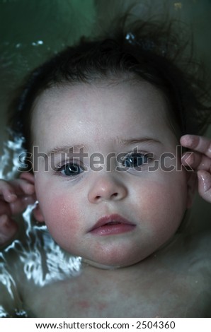 Baby face in water