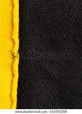 Black and yellow fabric background