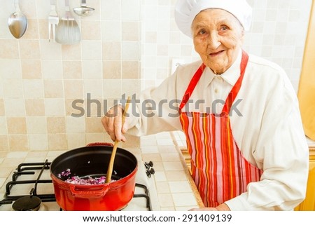 Grandmother preparing food in the kitchen.