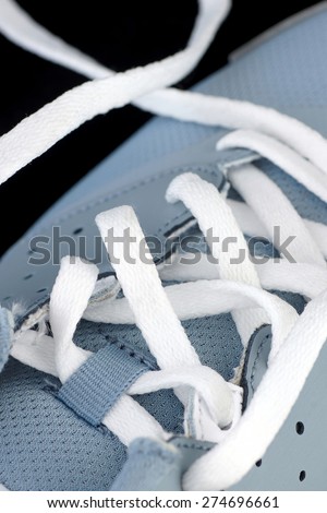 Untied shoelace on a running shoe,