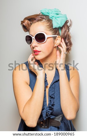 Attractive female in vintage/retro in modest yet fun fashion style