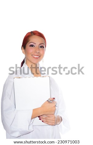 Young woman wearing a lab coat while holding a clipboard and standing
