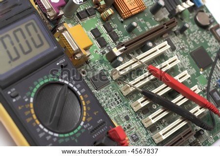 Memory Circuit Board Close Up with multimeter