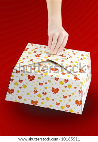 woman hand holding a cake box