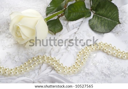nice wedding background wedding dress fabric with pearls and a rose