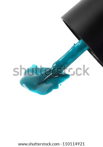 blue nail polish brush on white