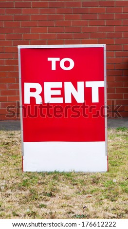 red rent billboard on the street