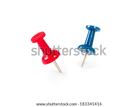 colorful push pins over white