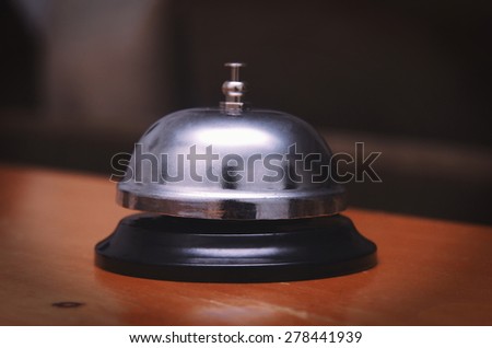 ring bell closeup on table