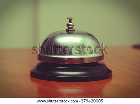 ring bell closeup on table,Vintage effect