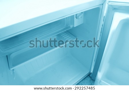inside shot of empty bar fridge