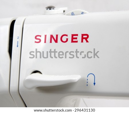 Melbourne,Australia-June,2,2015: Singer logo closeup.\
\
Singer Corporation is an American manufacturer of sewing machines, first established as I. M. Singer & Co. in 1851