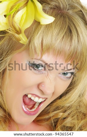 crazy beautiful woman with lily flower in hair