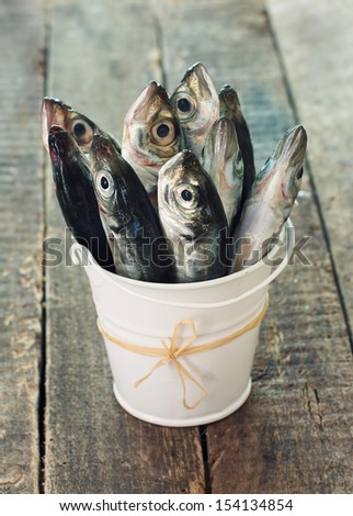 Raw fish (scad)  in a bucket