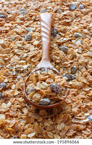 Muesli background with wood spoon of muesli