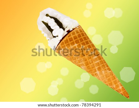 Wafer cone with ice cream over color background