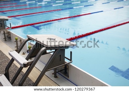 Start position with number 1 in competition swimming pool.