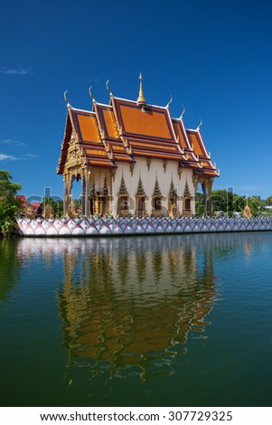 buddhistic pagoda reflected in water in Koh Samui island, Thailand