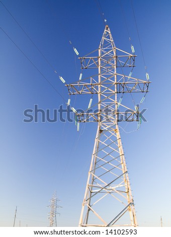 High power cable tower at blue sky background