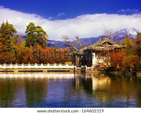 Landscape photo of Beautiful Pavilion In Black Dragon Pool Park, Lijiang Yunnan Province, China