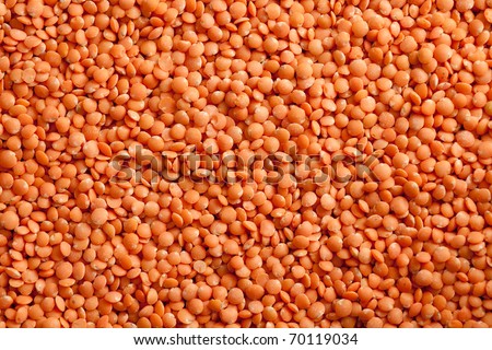 some red lentils forming a background pattern