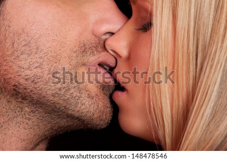 love kiss of young sexy heterosexual sensual couple
