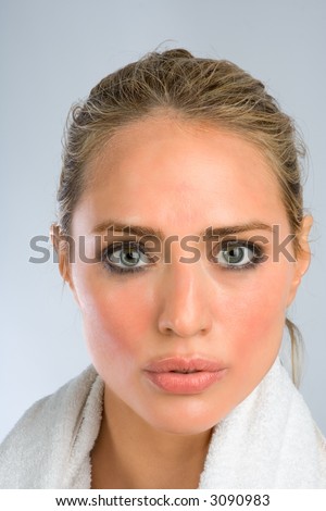 stock photo Sweaty girl with smashed makeup after workout