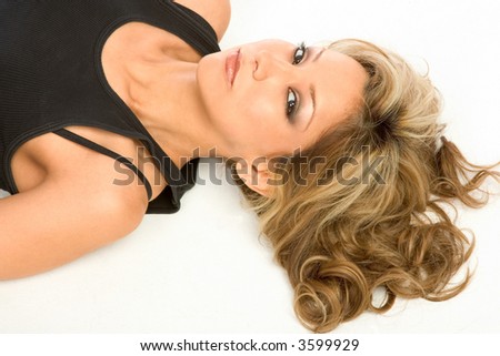 stock photo Blonde Latina Girl laying on the floor