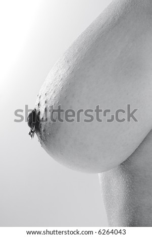 stock photo : Close-up of female breast with pierced nipple