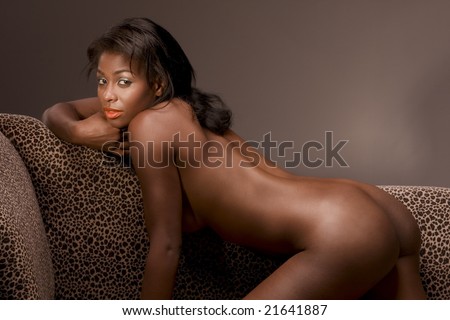 stock photo Hispanic hot nude woman on couch in sensual erotic seductive 