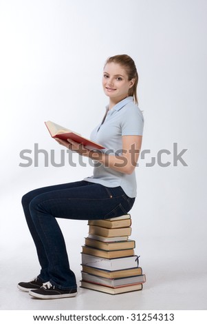 stock photo Young Caucasian high school schoolgirl student sitting on
