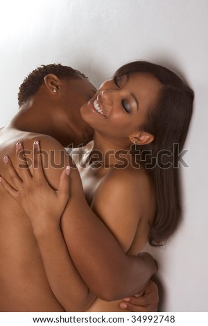 stock photo Loving ethnic black AfricanAmerican young affectionate nude 