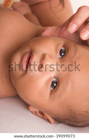 stock photo : biracial mix of Hispanic and black African American infant 