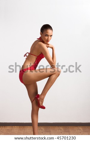 stock photo Young slender female fashion model of mixed Creole and 