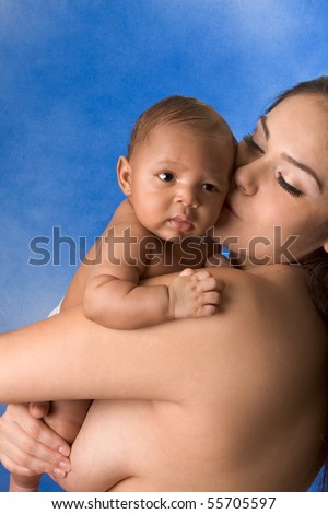 stock photo naked Hispanic mom holding her biracial mix of Hispanic and