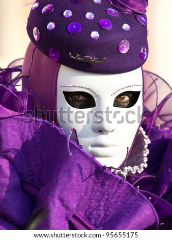 purple mask on the carnival in Venice