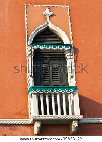 ancient balcony on the orange villa in Venice