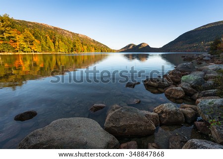 Mountain Lake in Early Autumn Sunlight